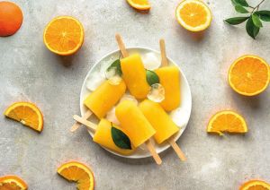 Pomarańczowe lody na patyku